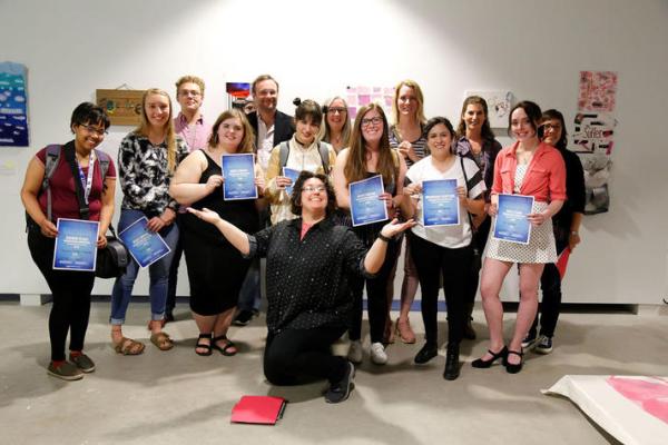 Jessica Burke. First row, l to r: Vanessa Cordero-Liberato, Sarah Caputi, Claire Thompson, Beatriz Ramos-Bouza, Jenna Roseman, Genna Melendez, Cat Kidman. Back: Andrew Maclin, Paul Rogers, Rogers, LeeAnn Paynter, Ember Kawarada, Rowe Moser, Rae Goodwin.