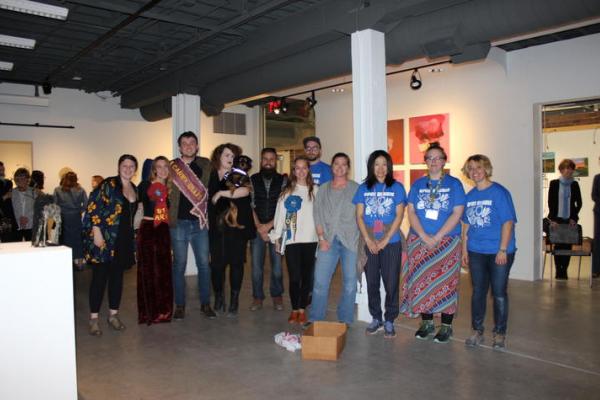 The three prize winners from the 2017 Carey Ellis Juried Student Show pose with juror and UK alumna Melanie VanHouten (in gray) and members of the Art Graduate Student Association, who helped organize Open Studio.