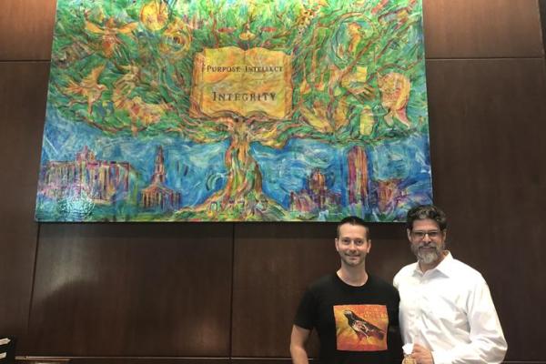 The Lewis Honors College commissioned a painting by artist Lennon Michalski (left) and Lewis Honors College Dean Christian Brady (right) worked closely with Michalski on the project.