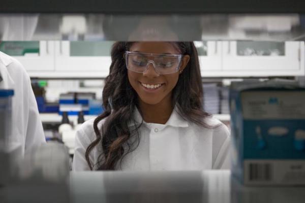 A neuroscience student works in Mark Prendergast's lab.