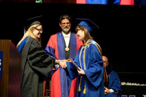 Rachel Lietzow receiving award