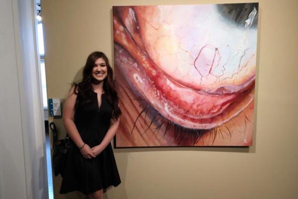 Reagan Profit's painting "Raw" earned her first place at the 2019 University Open.