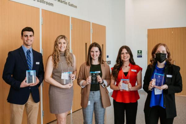 The 2022 Excellent Undergraduate Research Ambassadors Caleb Kennedy, Bridget Bolt, Shelby McCubbin, Gretchen Ruschman and Emily Keaton (not pictured is Courtney Martin).