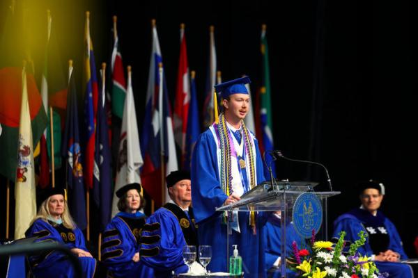 Ethan Morgan, a graduate from the UK College of Arts and Sciences and Lewis Honors College, delivers the student address at the 2 p.m. Friday, May 10 ceremony. UK Photo