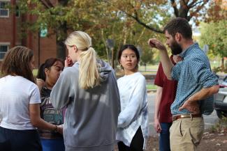 Dr. Kenton Sena with HON 152 students outdoors