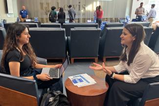 Tamika Tompoulidis with student during EXPO