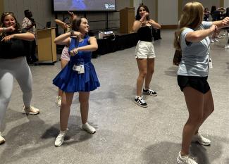 Students dancing at Lewis Launch