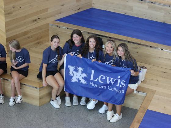 Class of 2029 holding LHC banner